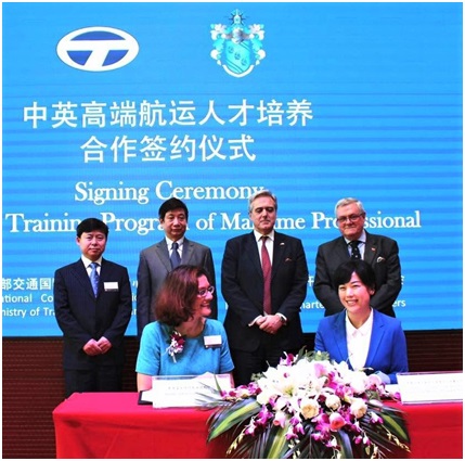 Julie signing MOU in Shanghai